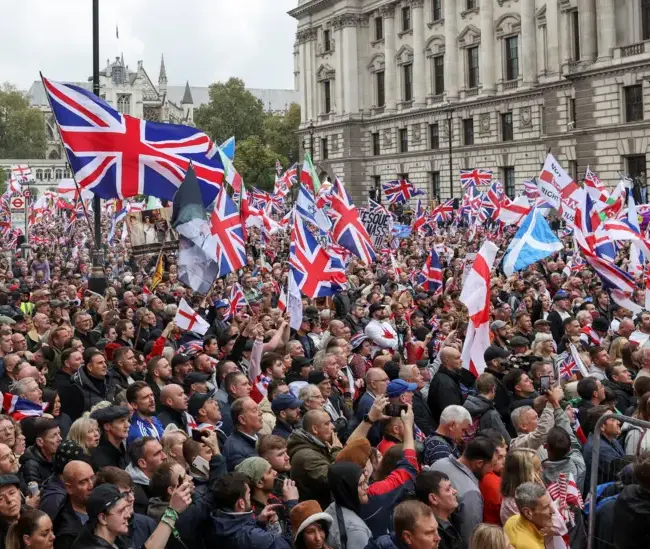 Thousands march over riots and deaths in custody